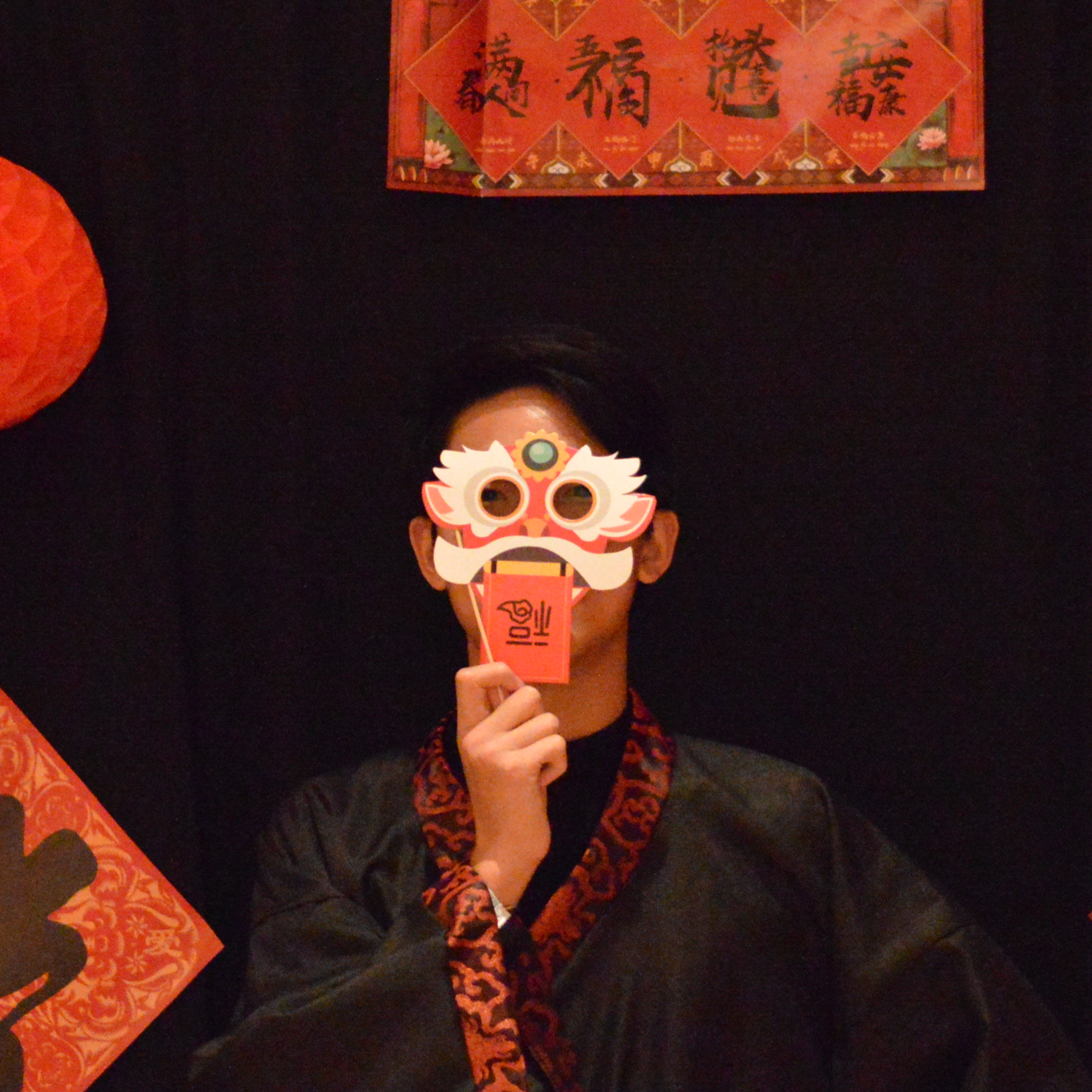 Alan dressed in traditional chinese clothing for Chinese American Student Association Lunar New Year event