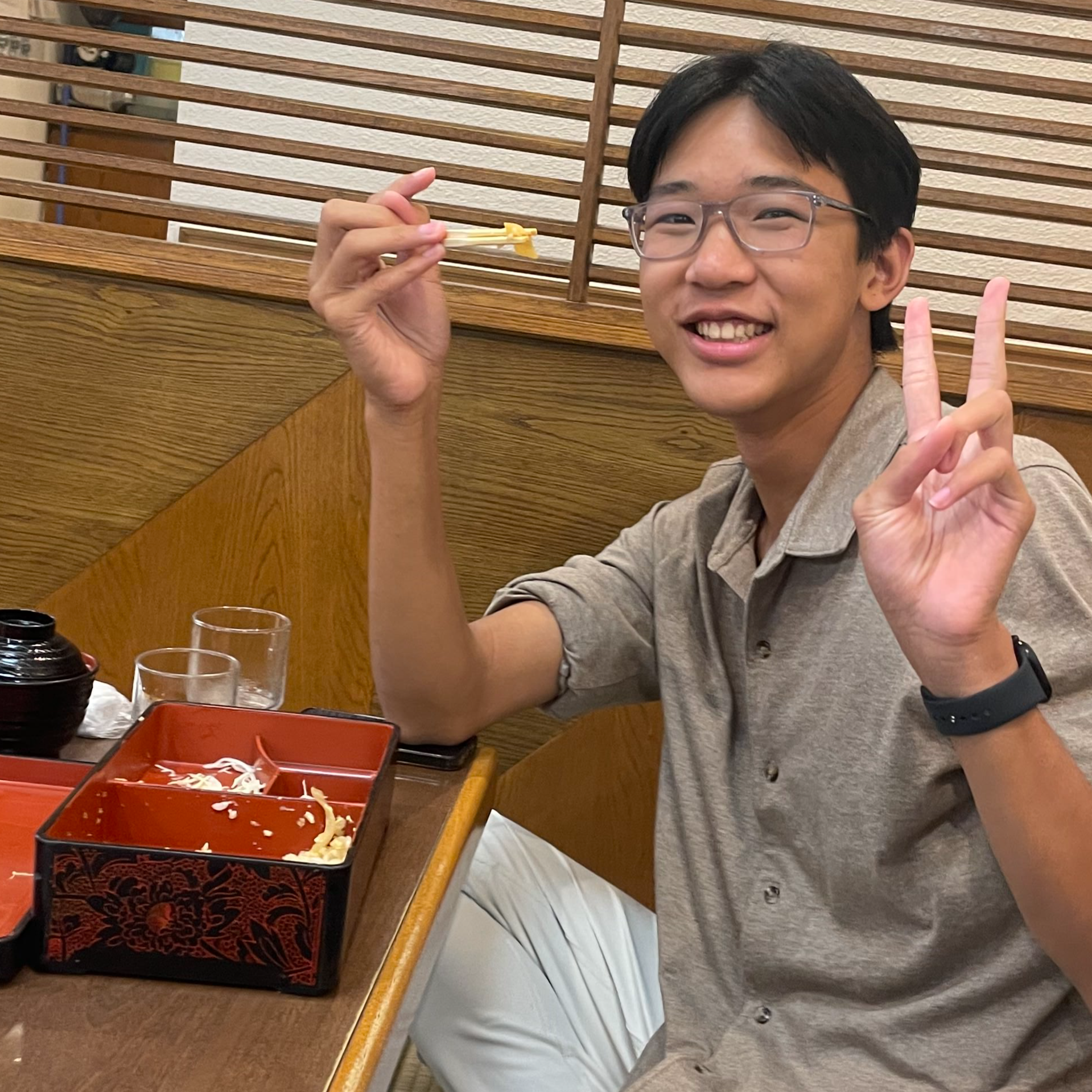 Alan eating bento in Japan